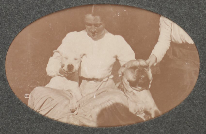 [Woman with two dogs]