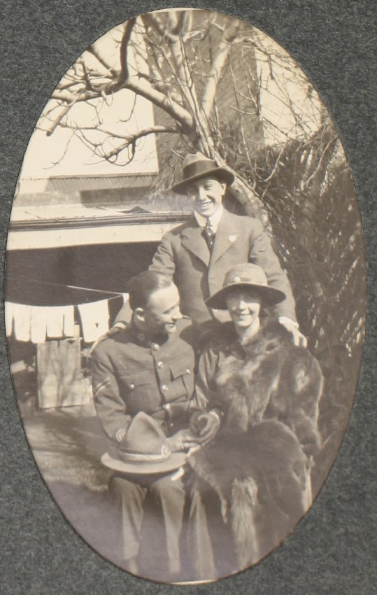 [Two men and a woman]