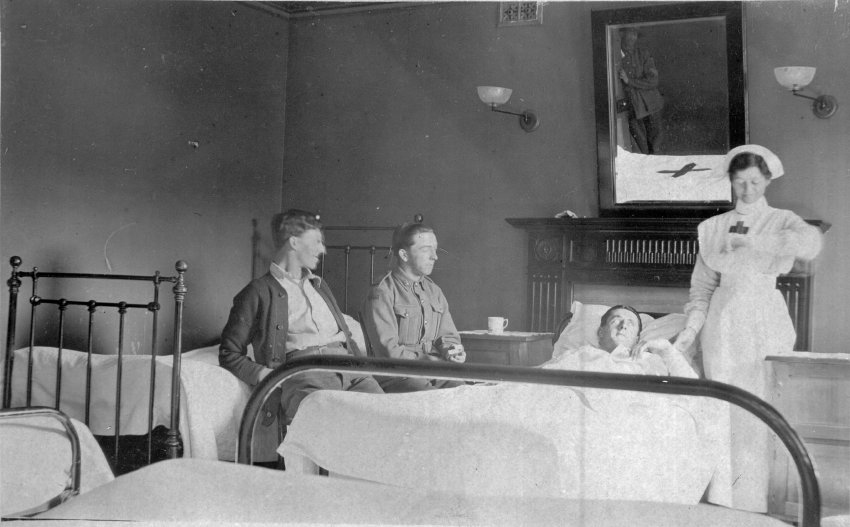 Nurse attending to patients at Booloominbah Convalescent Home