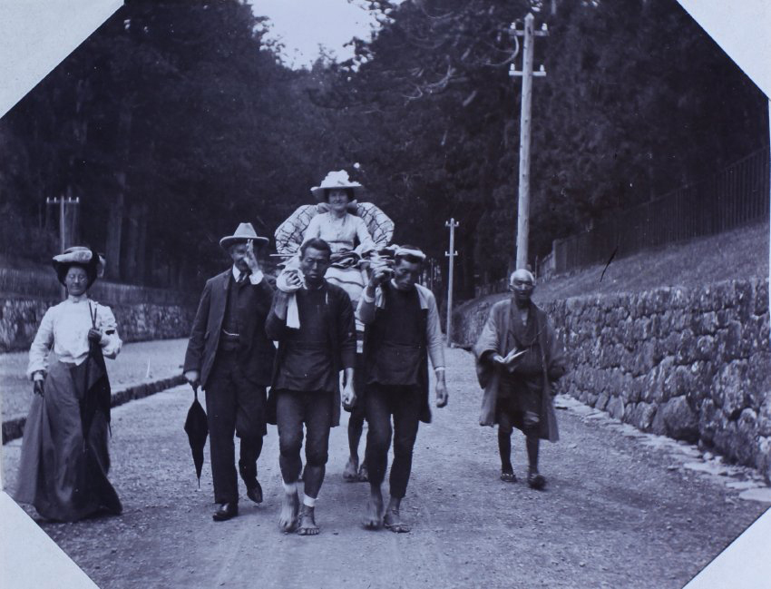 Women in sedan chair