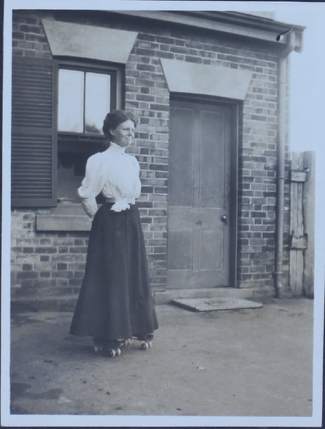 Unidentified woman outside a building