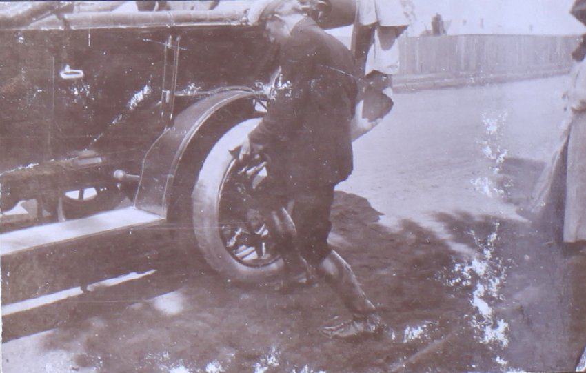 Man changing a flat tyre