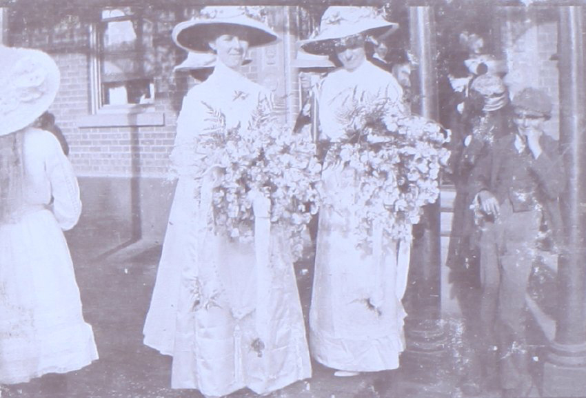 Two women with large bouquets