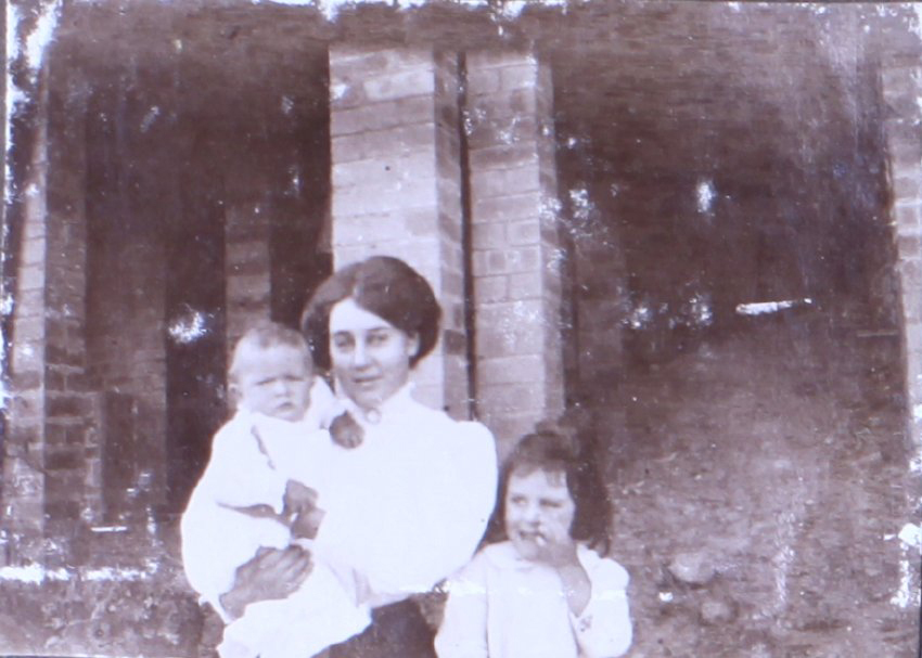 Unidentified woman and two children