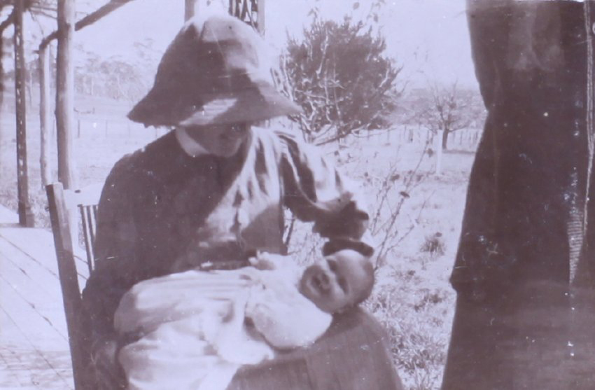 Unidentified woman and baby