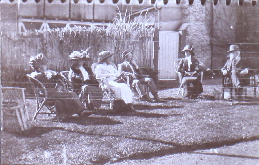 Group of two unidentified men and four women