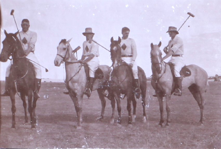 Four unidentified polo players
