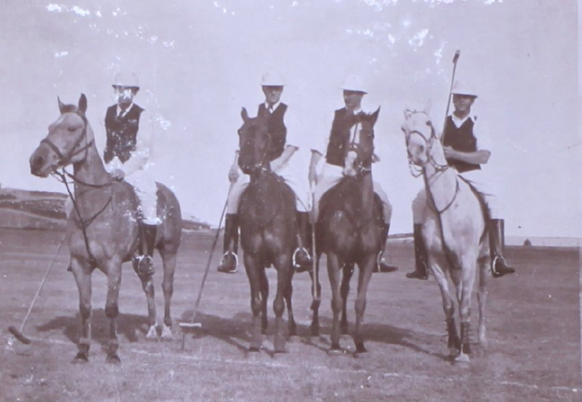 Four unidentified polo players