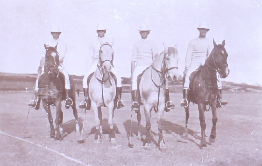 Four unidentified polo players