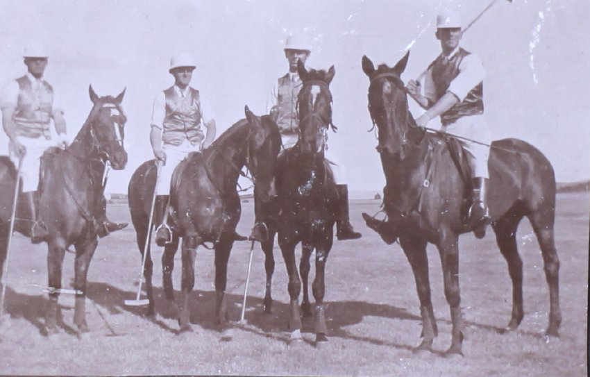 Four unidentified polo players