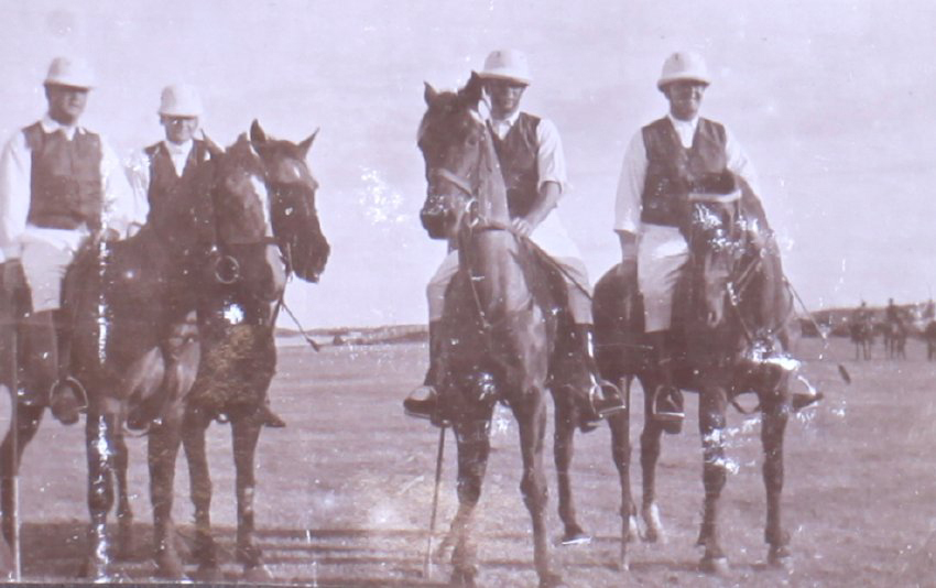 Four unidentified polo players