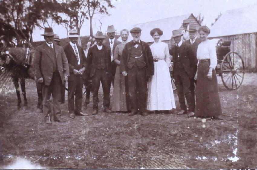 Unidentified group of people - nine men and three women