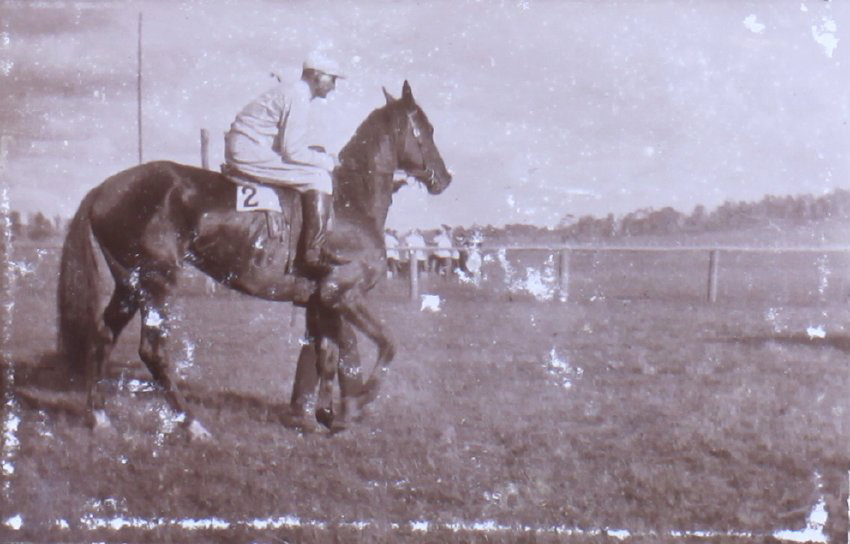 Unidentified jockey on a racehorse