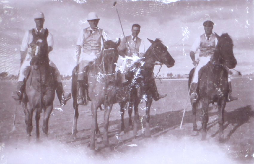 Four unidentified polo players on horseback