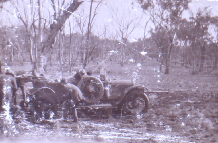 Unidentified people with a bogged car