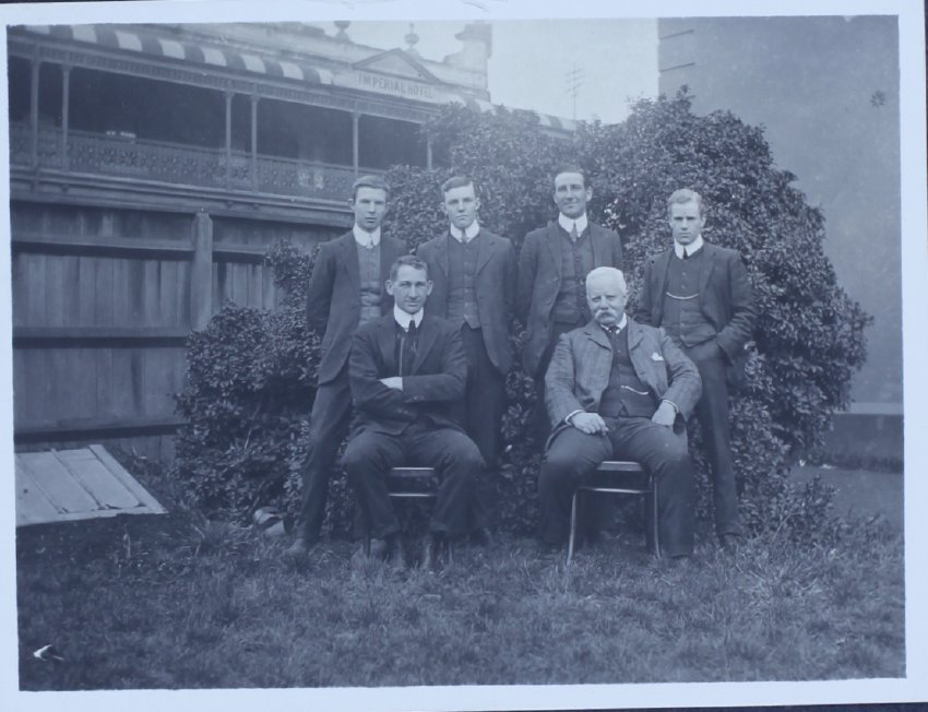 Six gentlemen with Imperial Hotel in the background, Armidale NSW