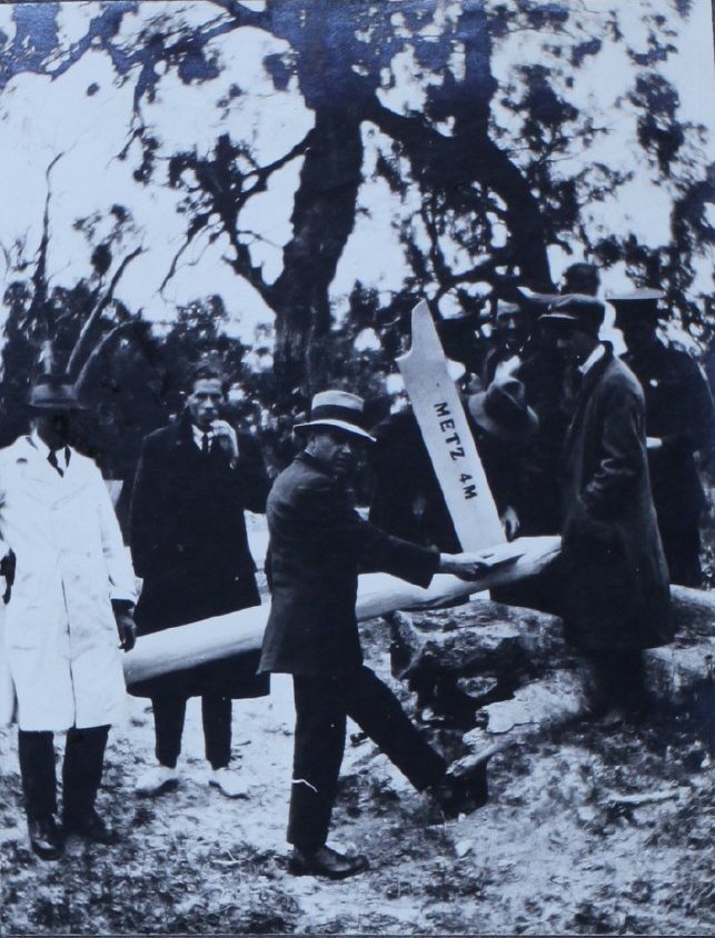 Group of men with the Metz sign, east of Armidale, NSW