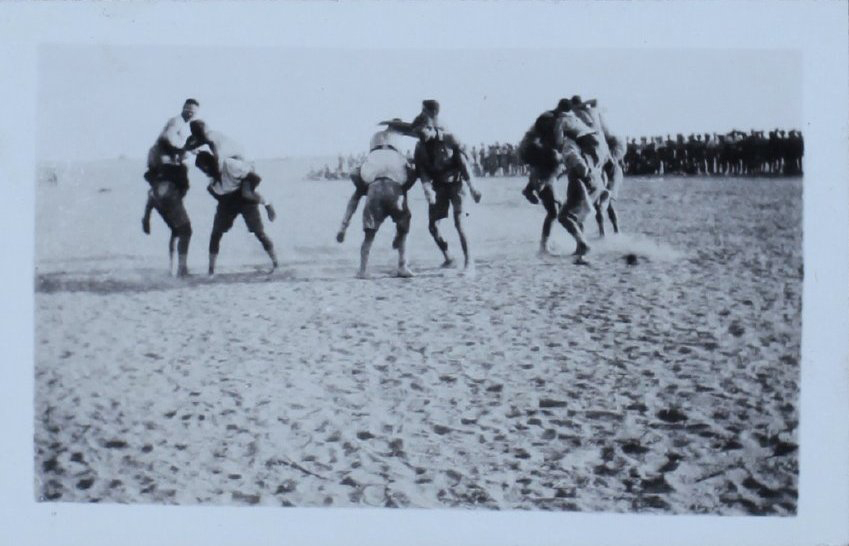 Soldiers playing in the desert