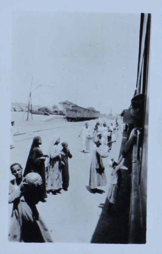 Locals at a train station