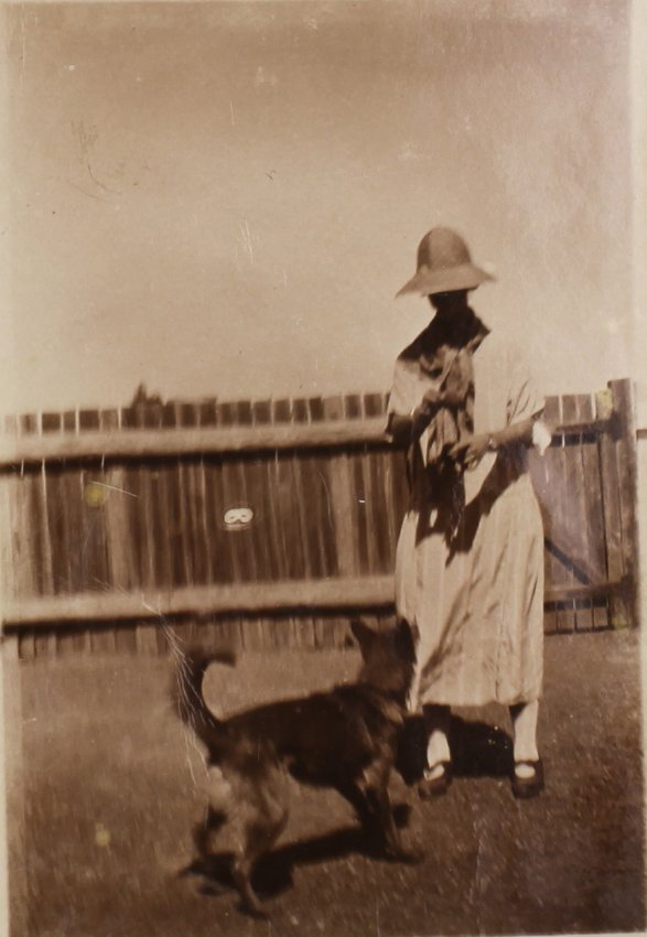 Unidentified woman and dog