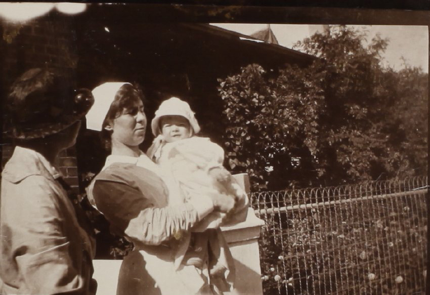 Unidentified woman, nurse and child