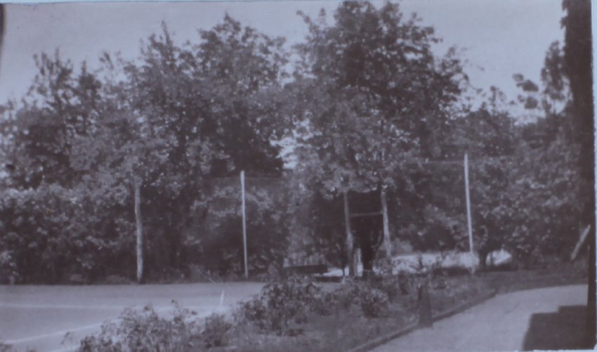 Tennis court and gardens at Saumarez