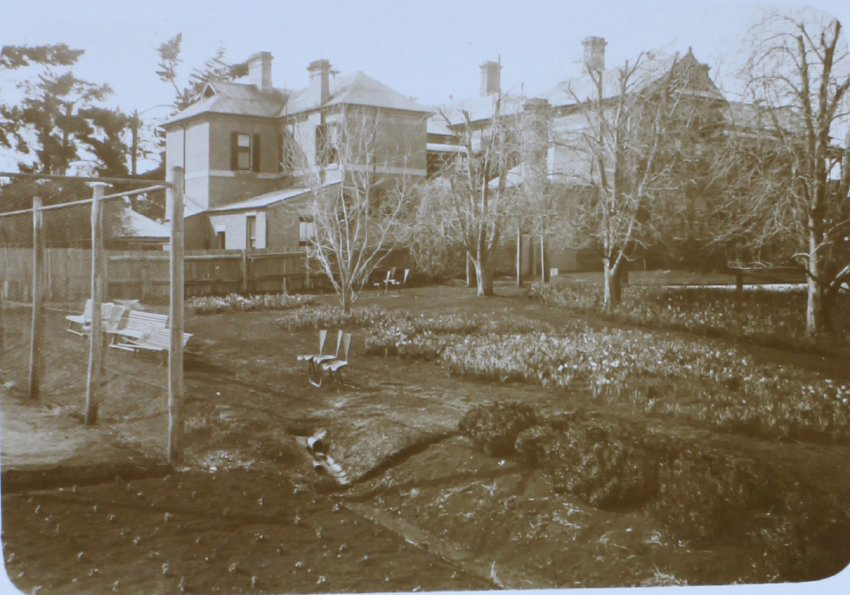 Gardens with homestead in the background