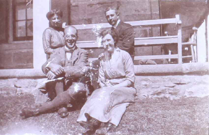Two unidentified men and two women