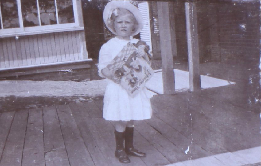 Unidentified child with a storybook