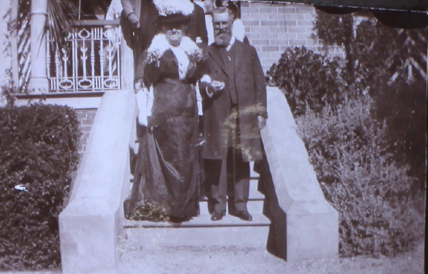 Unidentified couple on steps