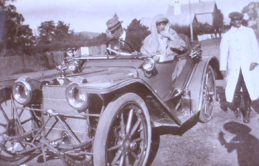 Unidentified couple in a car with another man