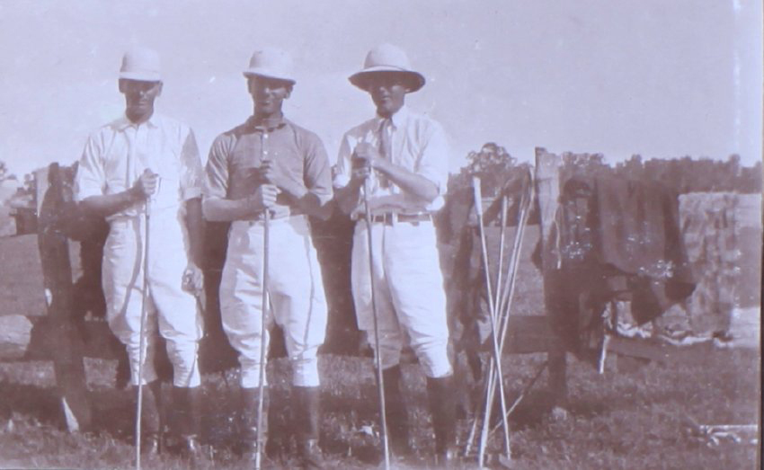 Three unidentified polo players