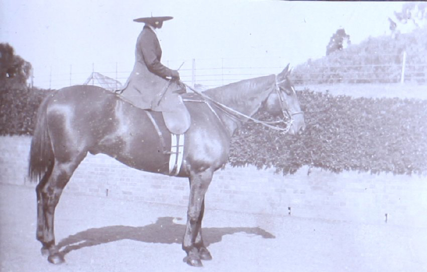 Unidentified woman on horseback