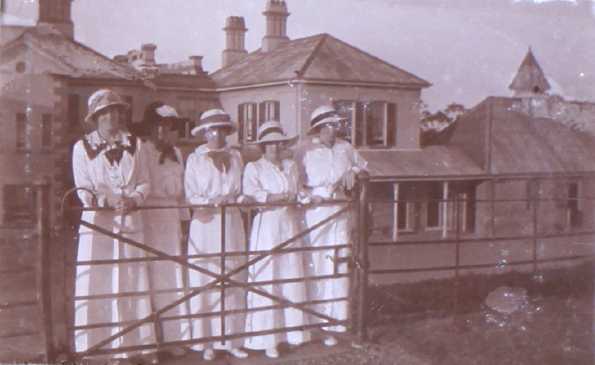 Five unidentified women in tennis attire