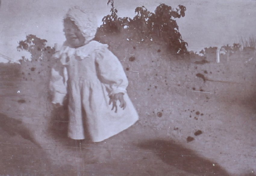 Unidentified child in the garden