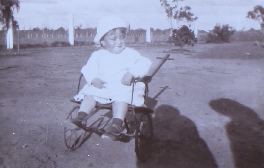 Unidentified child in a pram