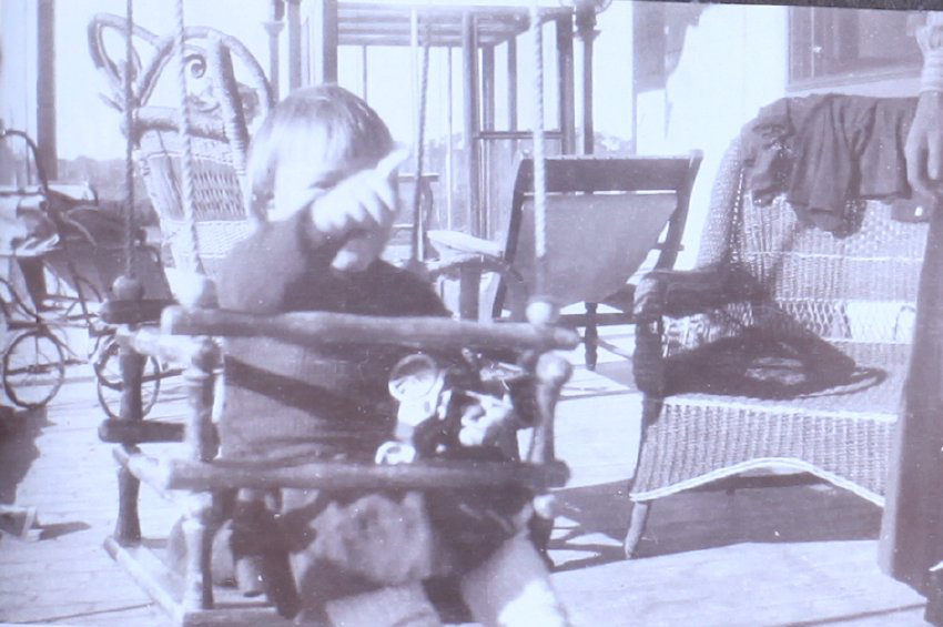 Unidentified child in a swing