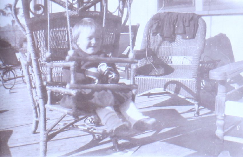 Unidentified child in a swing