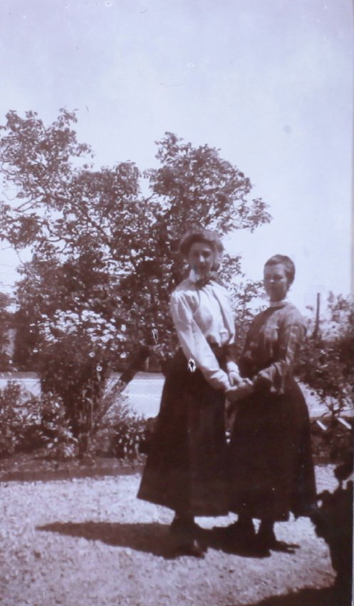 Two unidentified women in the garden