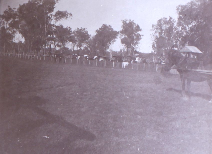 Outdoor scene - could be a race meeting[?]