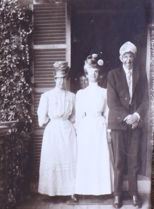 One unidentified man with two women