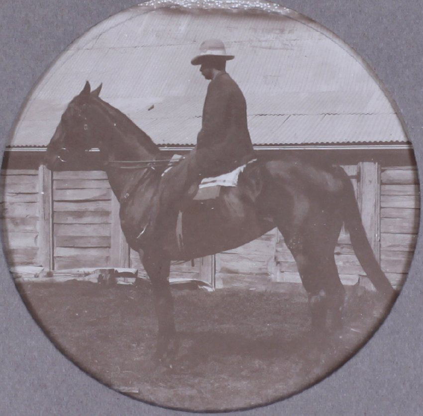 Unidentified man on a horse