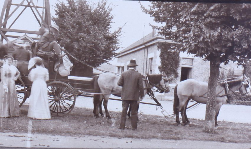 Unidentified group with a four horse drawn wagon