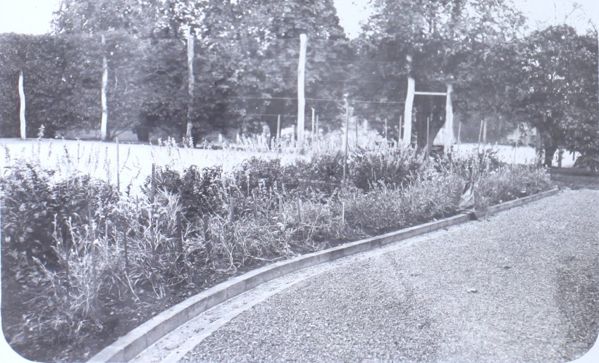 View of the gardens and the tennis court