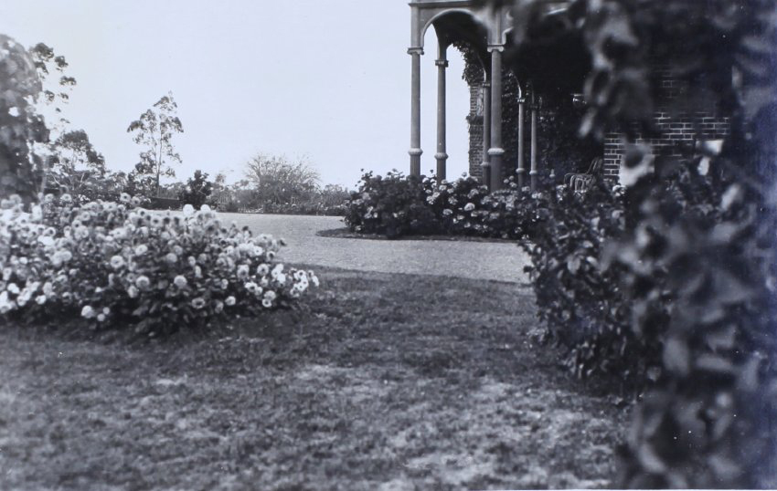 Gardens near the house with the house on the right