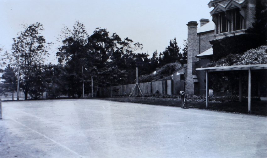 Tennis court and homestead