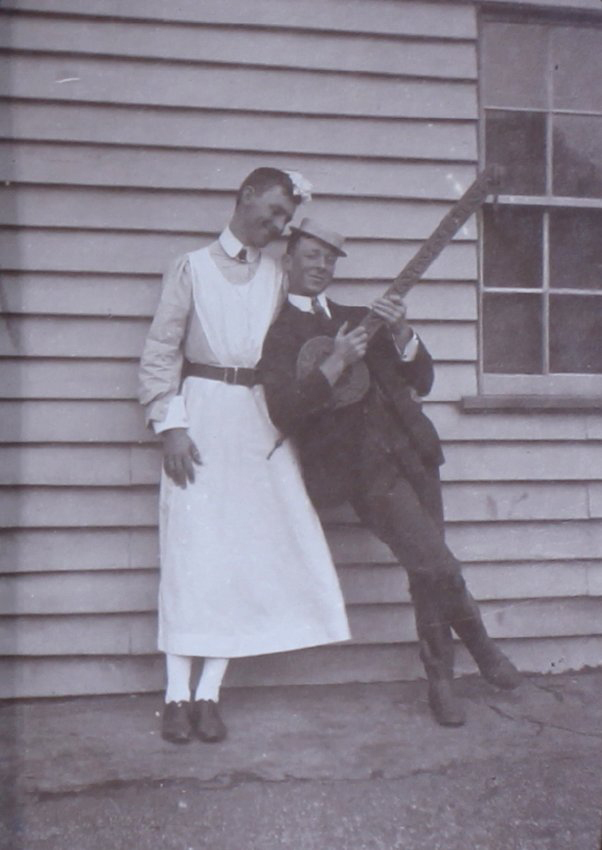 Two unidentified men in costume