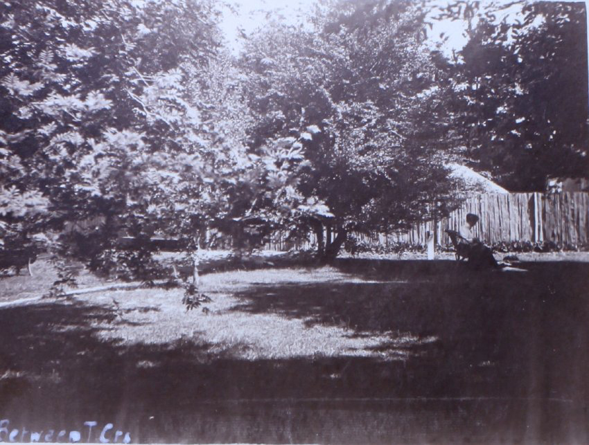 Between tennis courts