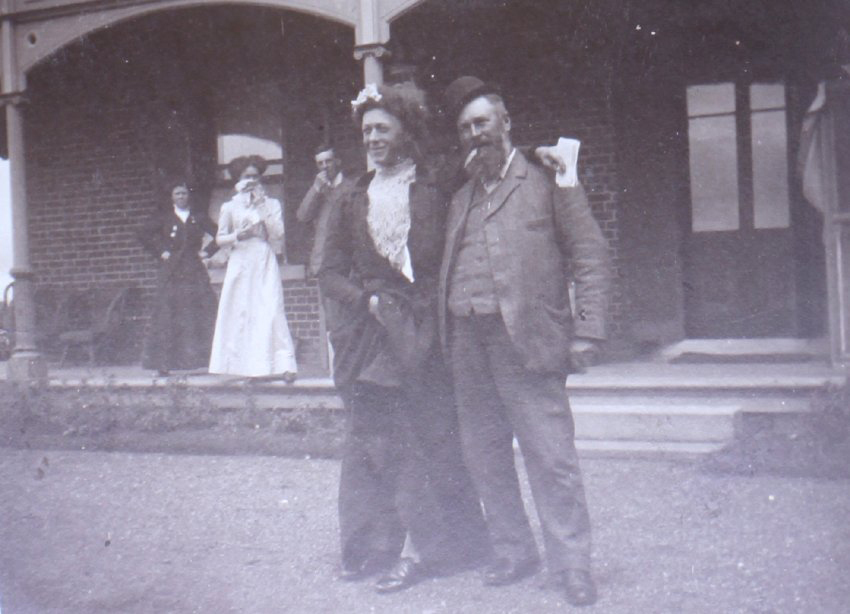 Unidentified group outside the homestead