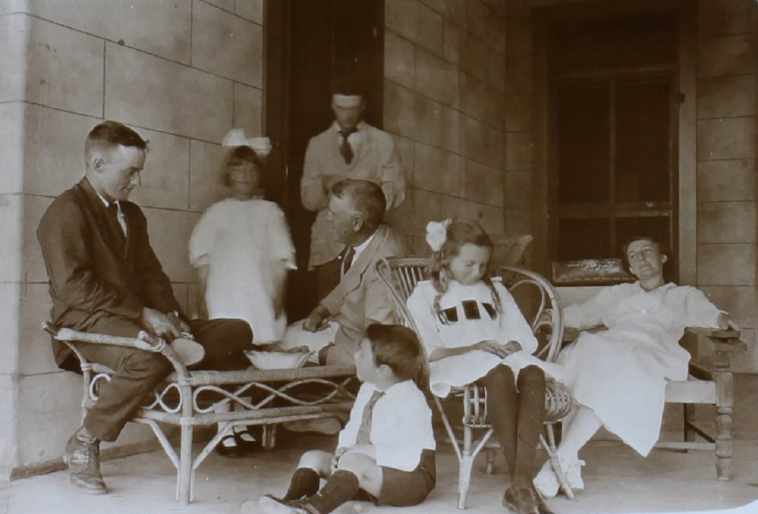 Unidentified group on a verandah